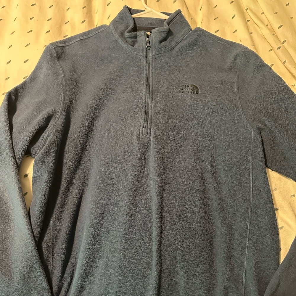 Navy blue north face quarter zip. Large. Worn but still in great condition.